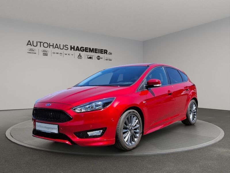 Candy rot metallic Gebraucht 2018 Ford Focus ST-Line Limousine | 12.950 € (Guter Preis) - Bild 1/4