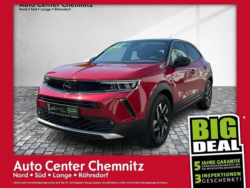 Power rot / black Gebraucht 2022 Opel Mokka-e Elegance SUV | 17.747 € (Fairer Preis) - Bild 1/4