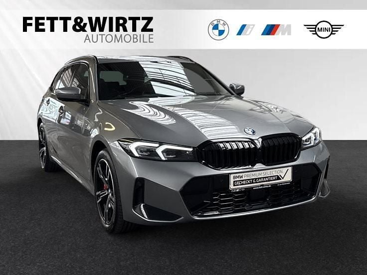 Skyscraper grau metallic Gebraucht 2024 BMW 330e M Sport Kombi | 51.900 € (Teuer) - Bild 1/2