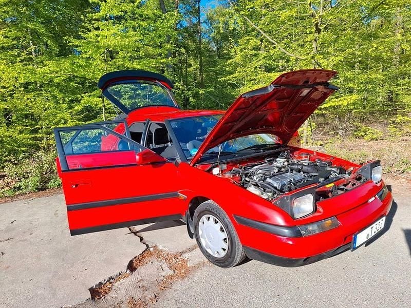Second-hand Mazda 323F 88 CP (64 kW) 1993 Roșu Berlinǎ