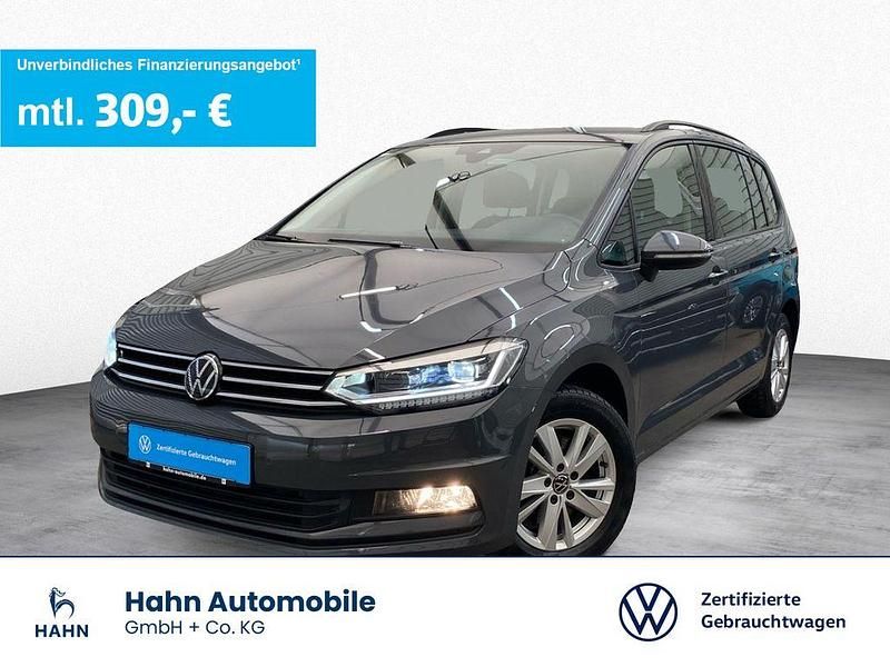 Grau Gebraucht 2023 VW Touran Comfortline Van / Kleinbus | 31.990 € (Fairer Preis) - Bild 1/3