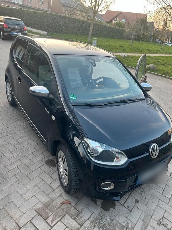 Używany VW up! 60 KM (44 kW) 2012 Czarny Hatchback