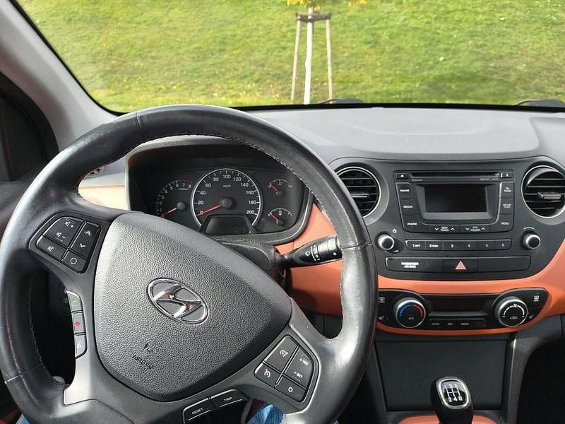 Orange Gebraucht 2014 Hyundai i10 Intro Edition Kleinwagen | 7.000 € (Guter Preis) - Bild 1/4