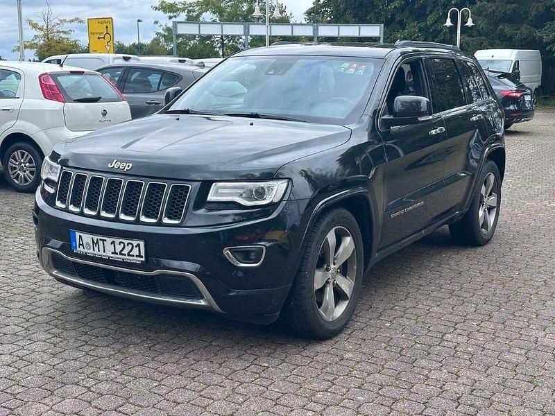Brilliant black crystal pearl (metallic) Gebraucht 2014 Jeep Grand Cherokee Overland SUV | 11.290 € (Teuer) - Bild 1/4
