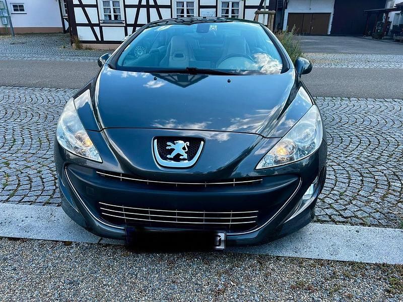Grau Gebraucht 2010 Peugeot 308 CC Premium Cabrio | 6.300 € (Fairer Preis) - Bild 1/4