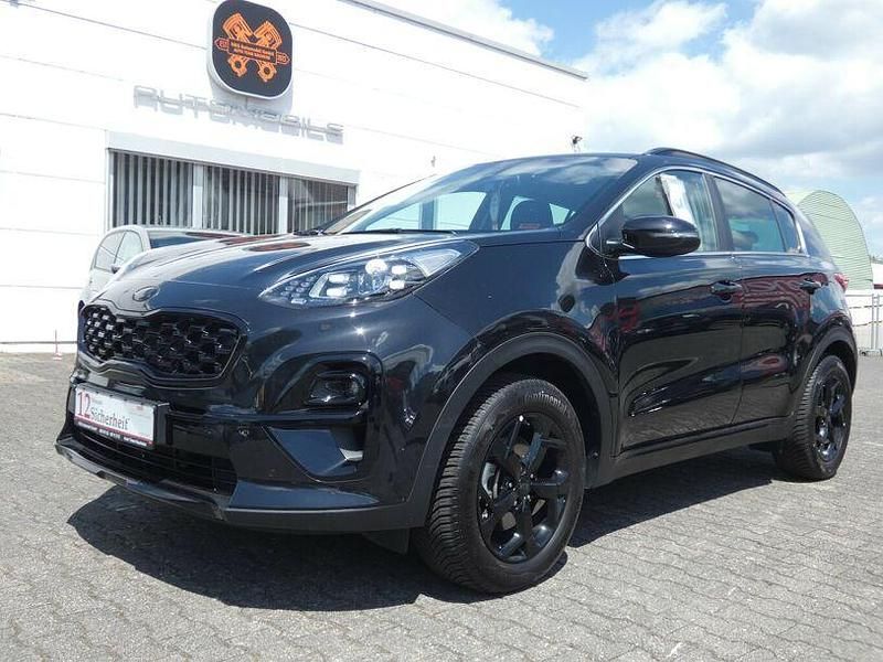 (1k) zilinaschwarz met. Gebraucht 2021 Kia Sportage SUV | 24.990 € (Guter Preis) - Bild 1/4