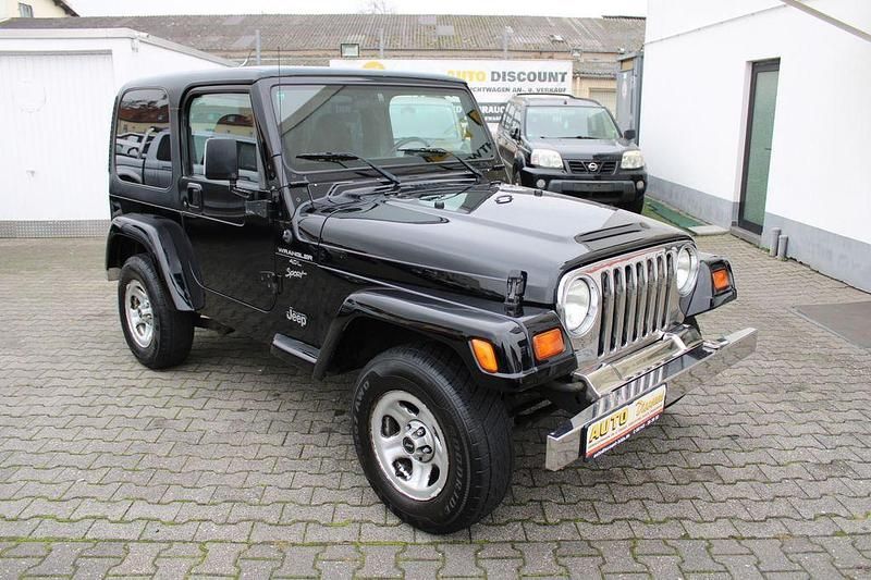 Schwarz Gebraucht 2000 Jeep Wrangler Sport SUV | 14.999 € (Fairer Preis) - Bild 1/4