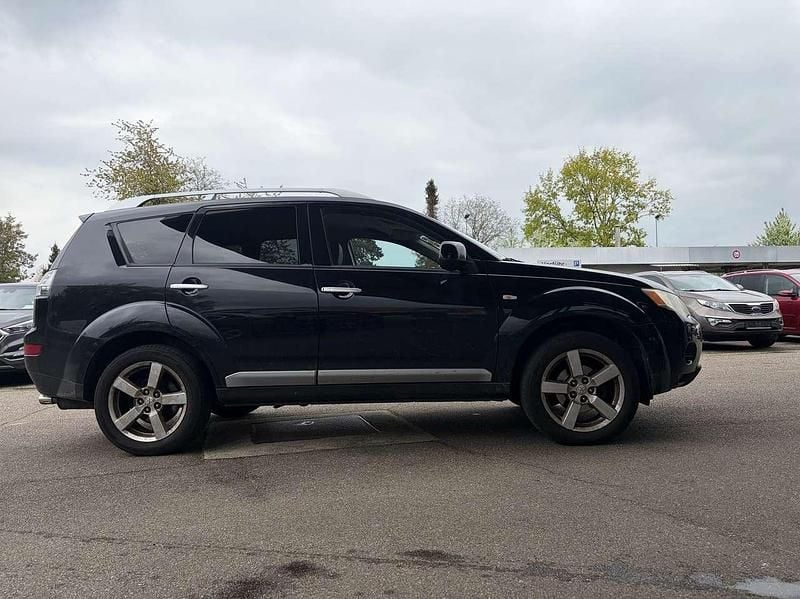 Gebraucht Mitsubishi Outlander Intense 156 PS (114 kW) 2010 Pantherschwarz (p) SUV