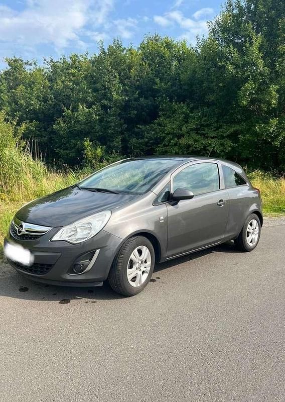 Grau Gebraucht 2011 Opel Corsa Edition Kleinwagen | 3.800 € (Fairer Preis) - Bild 1/4