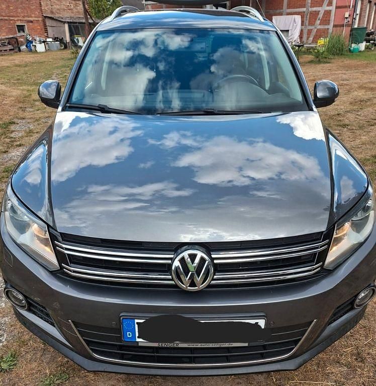 Grau Gebraucht 2014 VW Tiguan Sportline SUV | 14.500 € (Etwas zu teuer) - Bild 1/4