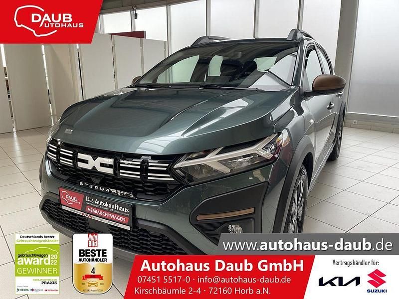 Oxidgrün Gebraucht 2024 Dacia Sandero Stepway Limousine | 17.490 € (Fairer Preis) - Bild 1/4
