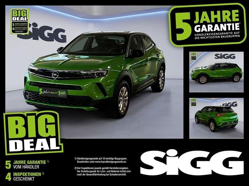Matcha green/ikone gruen Gebraucht 2022 Opel Mokka-e Edition SUV | 15.980 € (Guter Preis) - Bild 1/4