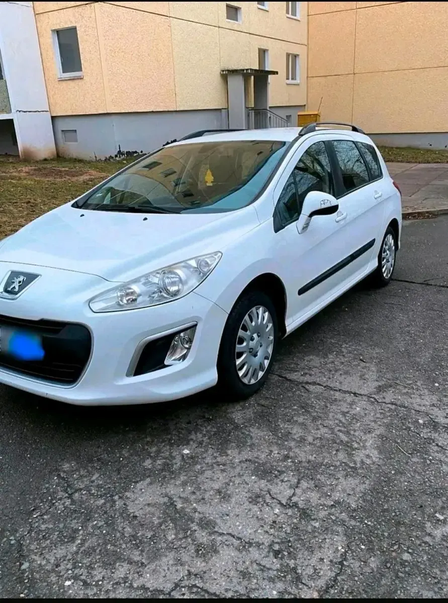 Gebraucht Peugeot 308 105 PS (77 kW) 2012 Weiß Kombi