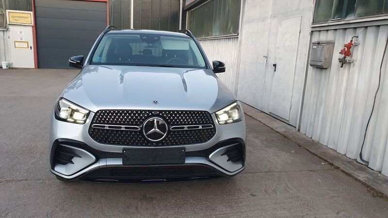 Silber Gebraucht 2024 Mercedes GLE450 AMG AMG line SUV | 80.000 € - Bild 1/4