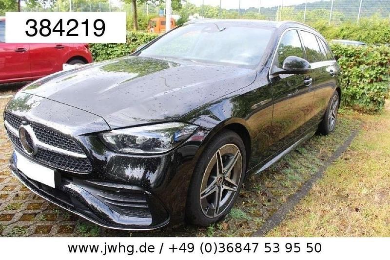 Obsidianschwarz (metallic) Gebraucht 2023 Mercedes C300e AMG Kombi | 36.950 € (Superpreis) - Bild 1/4