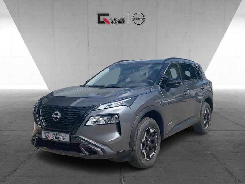Gun metallic Gebraucht 2024 Nissan X-Trail SUV | 34.391 € (Fairer Preis) - Bild 1/4