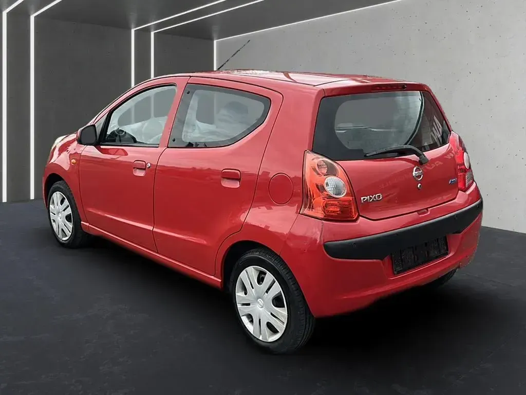 Gebraucht Nissan Pixo Acenta 68 PS (50 kW) 2010 Rot Kleinwagen