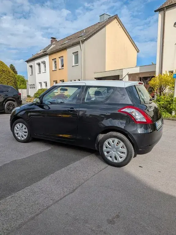 Usado Suzuki Swift 94 HP (69 kW) 2014 Preto Citadino