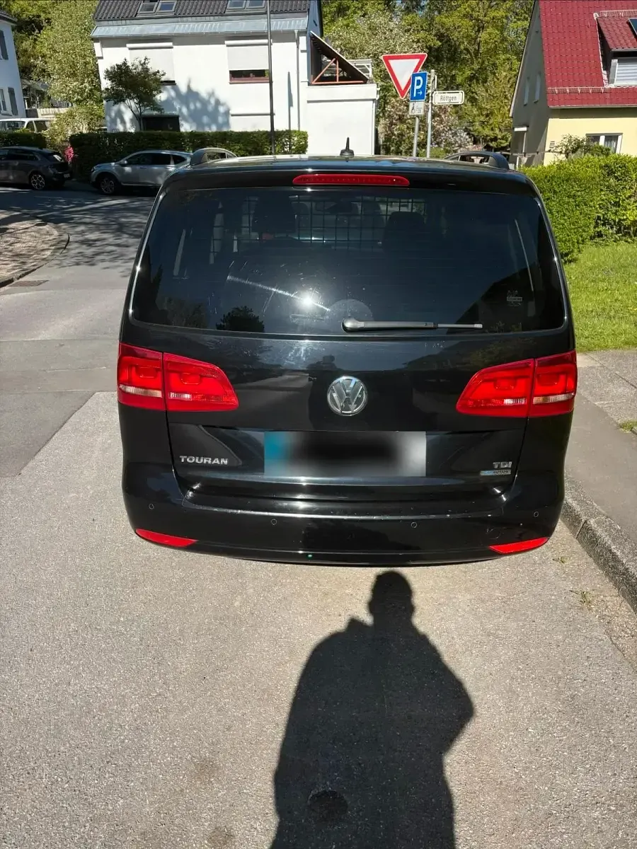 Gebraucht VW Touran Highline 105 PS (77 kW) 2010 Schwarz Van / Kleinbus