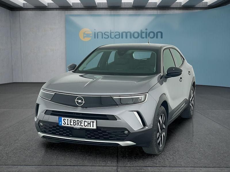 Grau Gebraucht 2023 Opel Mokka-e Elegance SUV | 22.699 € (Fairer Preis) - Bild 1/4