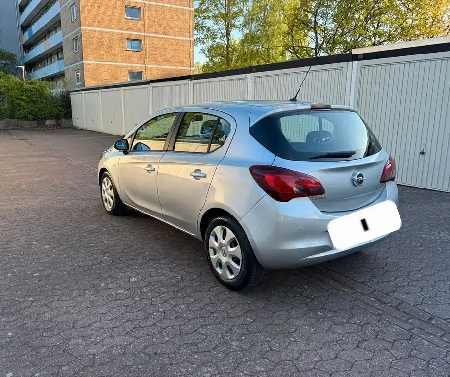 Second-hand Opel Corsa Active 90 CP (66 kW) 2015 Argintiu Hatchback