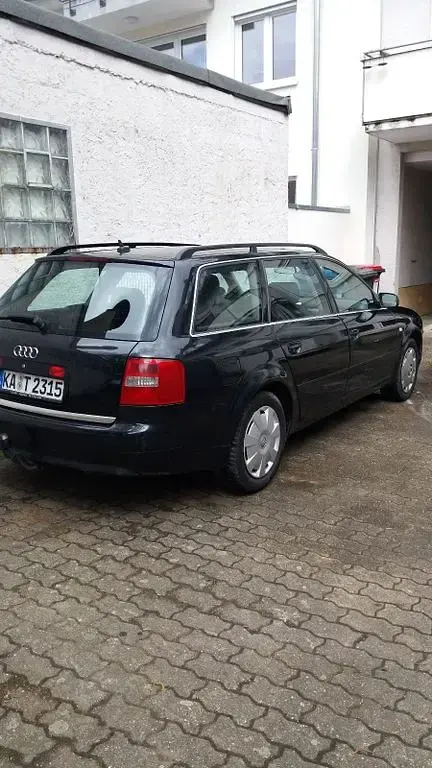 Używany Audi A6 131 KM (96 kW) 2003 Czarny Kombi