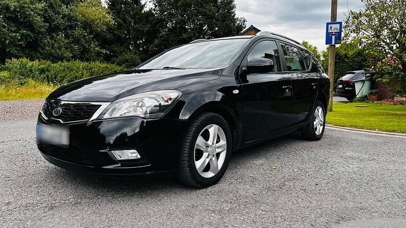 Schwarz Gebraucht 2011 Kia Ceed Sportswagon Kombi | 6.390 € - Bild 1/4