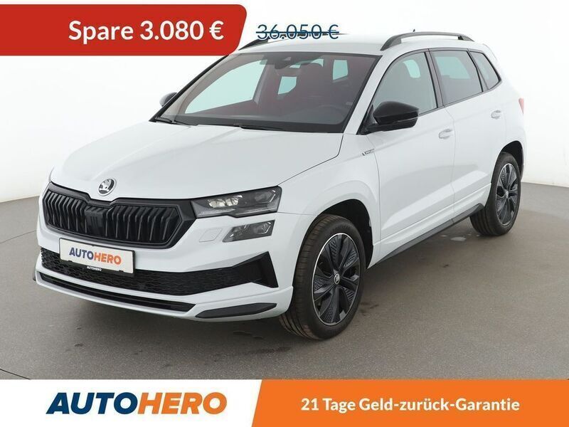 Weiß Gebraucht 2024 Skoda Karoq SportLine SUV | 32.160 € (Fairer Preis) - Bild 1/3