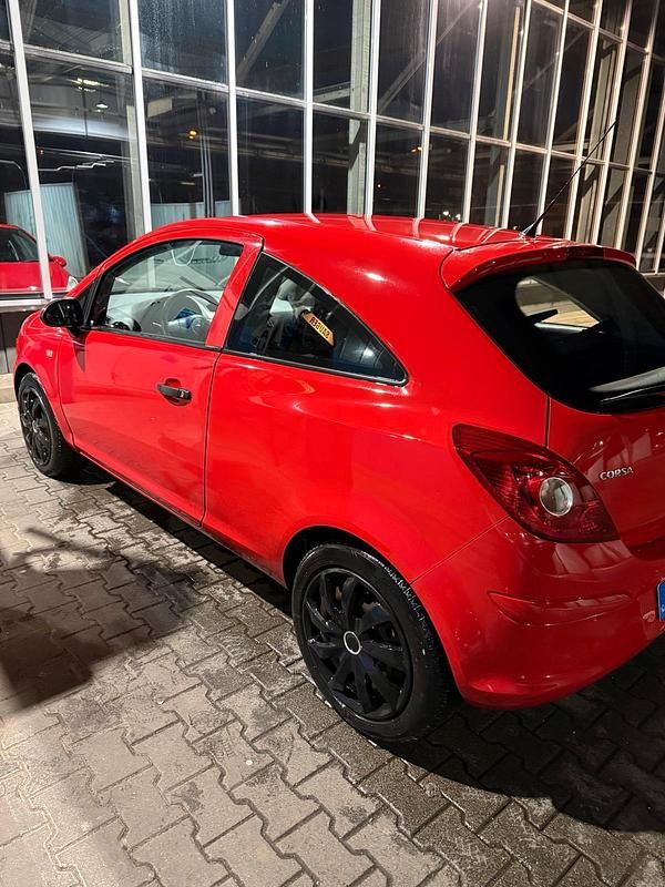 Second-hand Opel Corsa Selection 80 CP (58 kW) 2009 Roșu Hatchback
