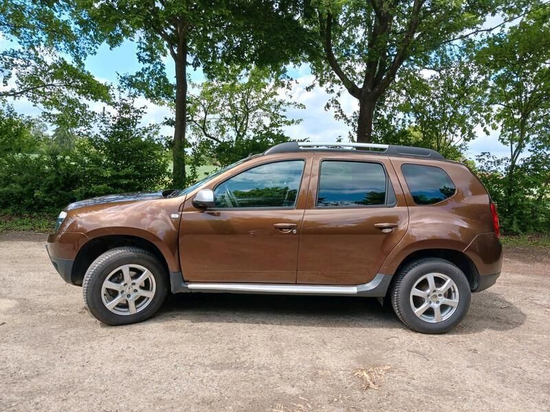 Braun Gebraucht 2011 Dacia Duster Prestige SUV | 7.850 € (Fairer Preis) - Bild 1/4