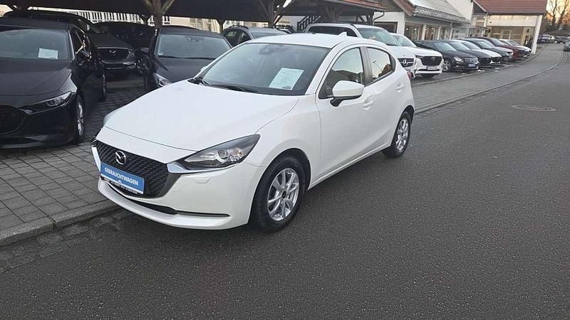 Satinweiß metallic Gebraucht 2021 Mazda 2 Kizoku Kleinwagen | 14.990 € (Fairer Preis) - Bild 1/4