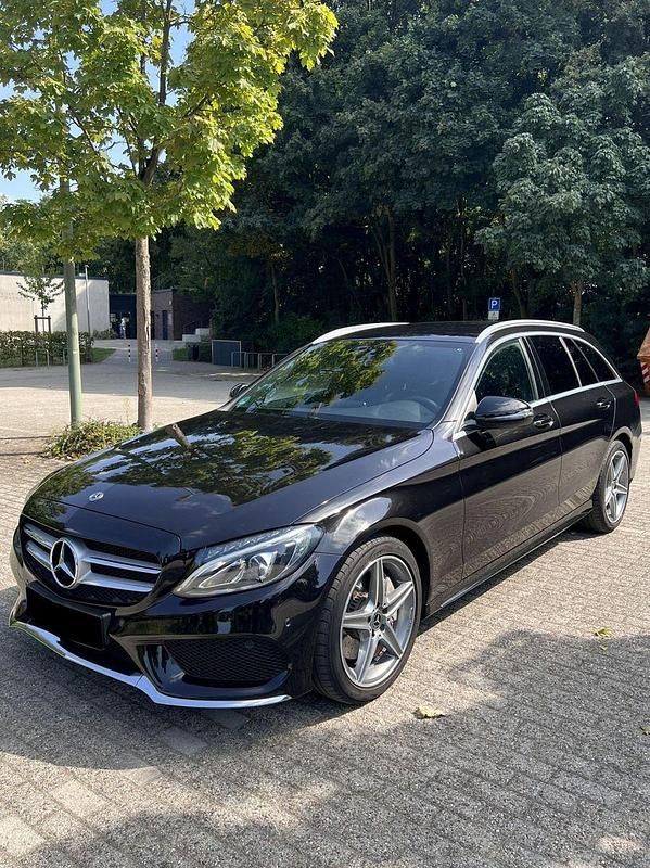 Schwarz Gebraucht 2018 Mercedes C250 AMG line Kombi | 23.990 € (Guter Preis) - Bild 1/4