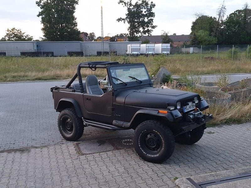 Schwarz Gebraucht 1988 Jeep Wrangler SUV | 12.900 € - Bild 1/4
