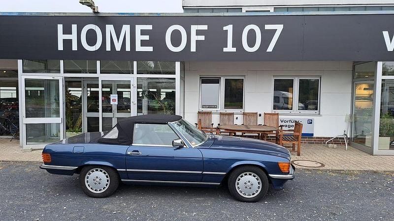 Nautikblau (9290) Gebraucht 1988 Mercedes SL300 Cabrio | 49.950 € - Bild 1/4