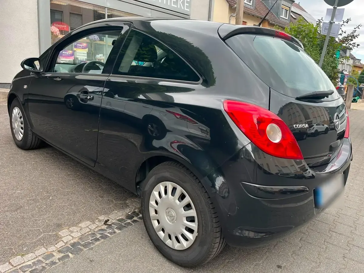 Gebraucht Opel Corsa 71 PS (52 kW) 2012 Schwarz Kleinwagen