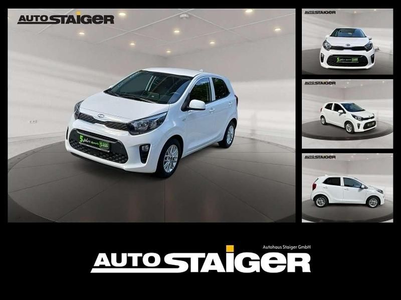 (ud) schneeweiss Gebraucht 2021 Kia Picanto DREAM-TEAM Edition Kleinwagen | 12.490 € (Fairer Preis) - Bild 1/4