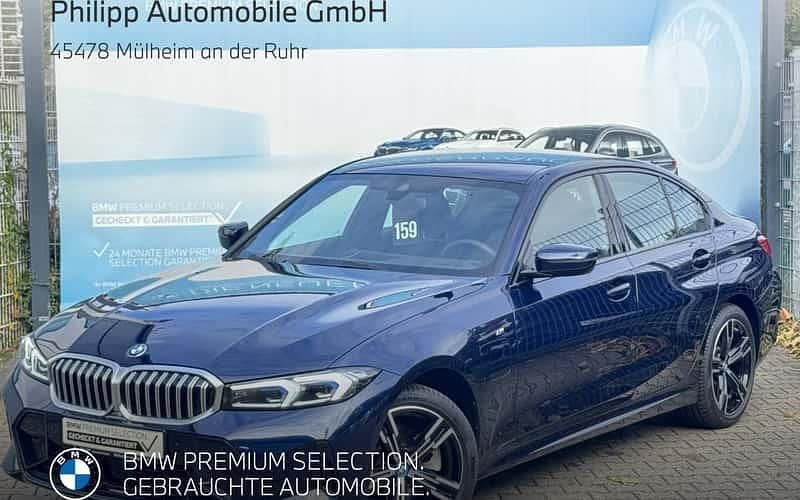 Tansanitblau ii Gebraucht 2024 BMW 330e M Sport Limousine | 44.880 € (Guter Preis) - Bild 1/4