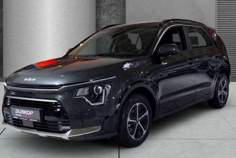 Knacr81egs5235292 Gebraucht 2024 Kia Niro Comfort SUV | 29.990 € (Superpreis) - Bild 1/4