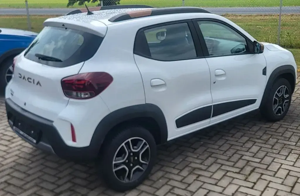 Gebraucht Dacia Spring Extreme 47 kW (65 PS) 2023 Weiß Kleinwagen