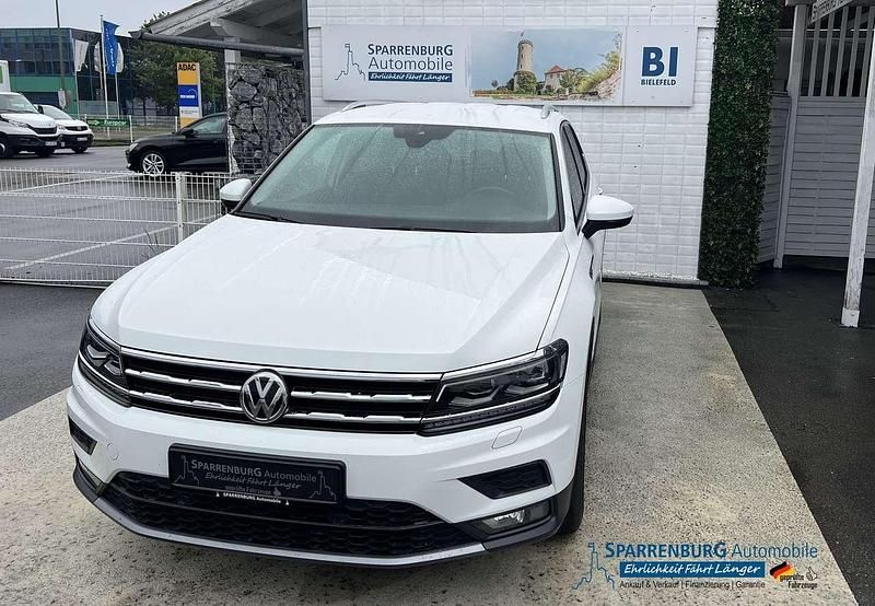 Pure white Gebraucht 2018 VW Tiguan Allspace Trendline SUV | 26.199 € (Fairer Preis) - Bild 1/3