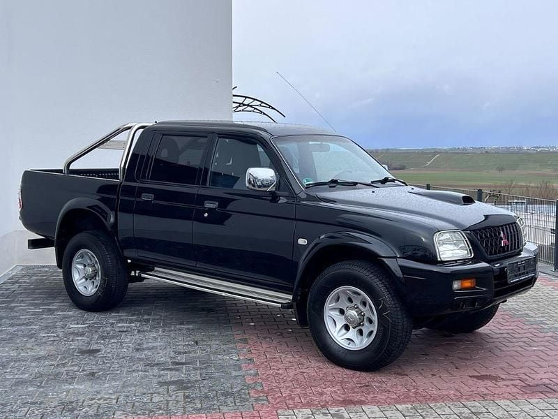 Schwarz Gebraucht 2003 Mitsubishi L200 Abholung | 14.900 € - Bild 1/4