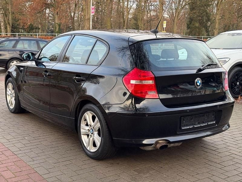 Second-hand BMW 116 122 CP (89 kW) 2008 Negru Hatchback