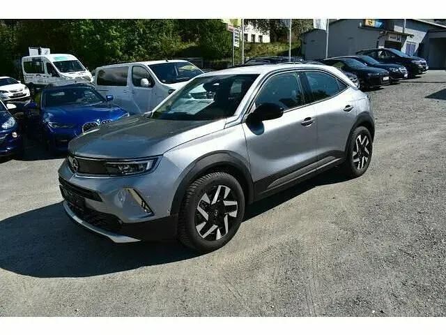 Gebraucht Opel Mokka-e Elegance 100 kW (136 PS) 2022 Kontrast grau/dach weiß (metallic) SUV