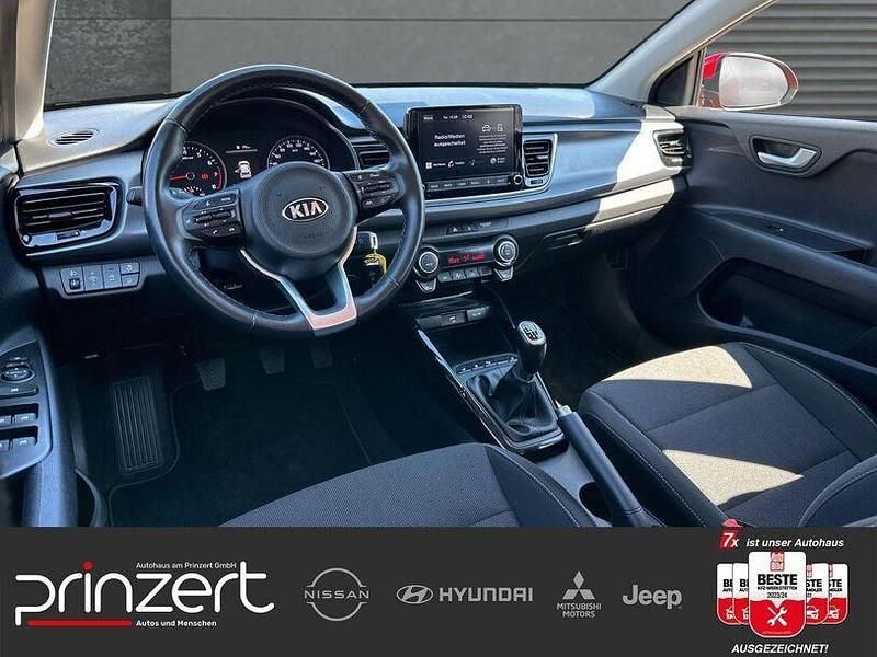 Gebraucht Kia Rio Vision 101 PS (74 kW) 2021 (beg) signalrot met. Limousine