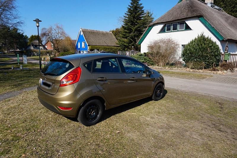Gebraucht Ford Fiesta 81 PS (59 kW) 2011 Gold Kleinwagen