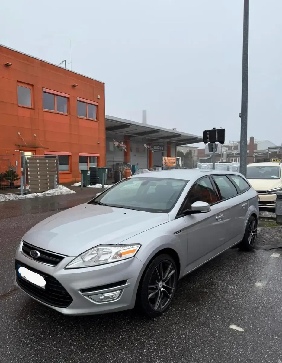 Używany Ford Mondeo 140 KM (102 kW) 2011 Srebrny Kombi