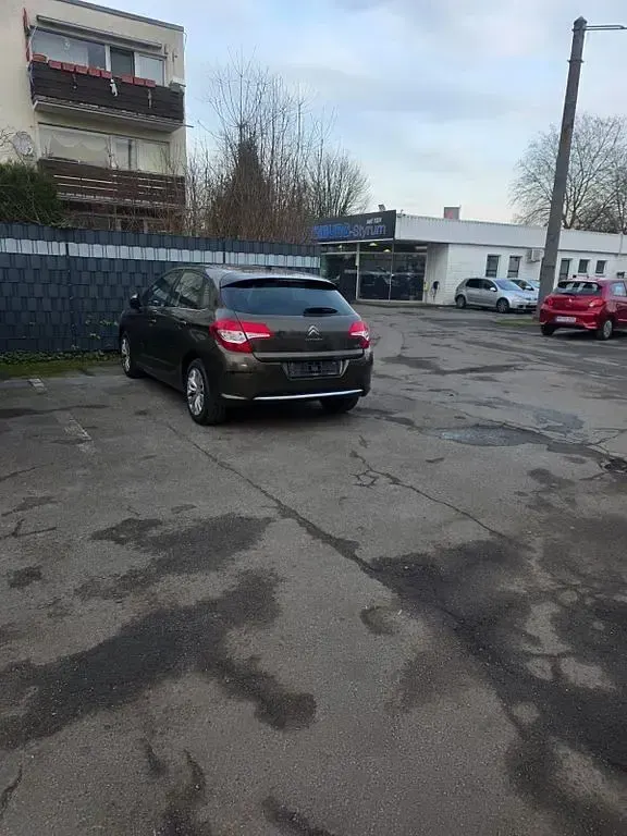 Gebraucht Citroën C4 SELECTION 120 PS (88 kW) 2013 Braun Limousine