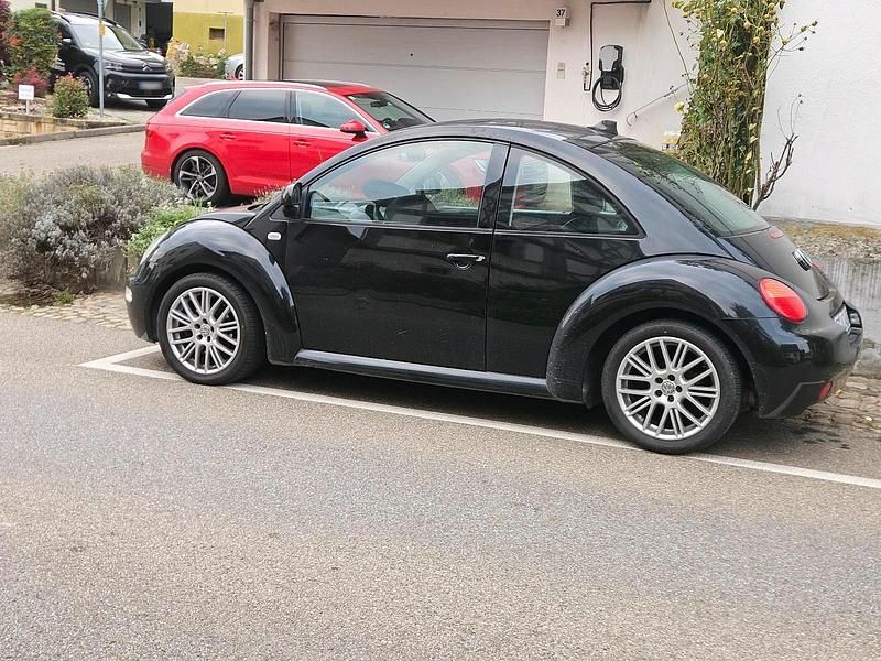 Gebraucht VW New Beetle 115 PS (84 kW) 2000 Schwarz Kleinwagen