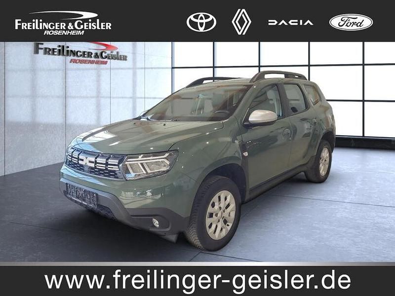 Staubgrau Gebraucht 2024 Dacia Duster Expression SUV | 17.880 € - Bild 1/4