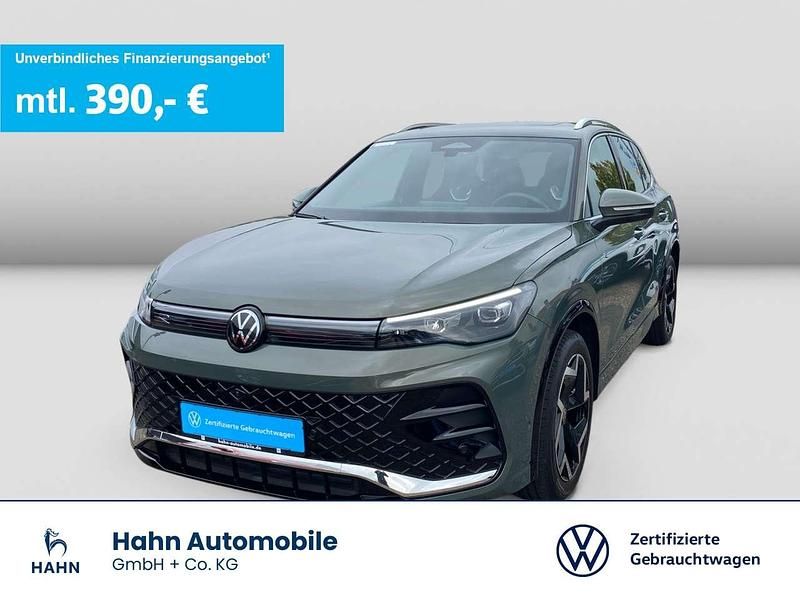 Cipressinogrün metallic Gebraucht 2024 VW Tiguan R-line SUV | 42.999 € (Teuer) - Bild 1/3